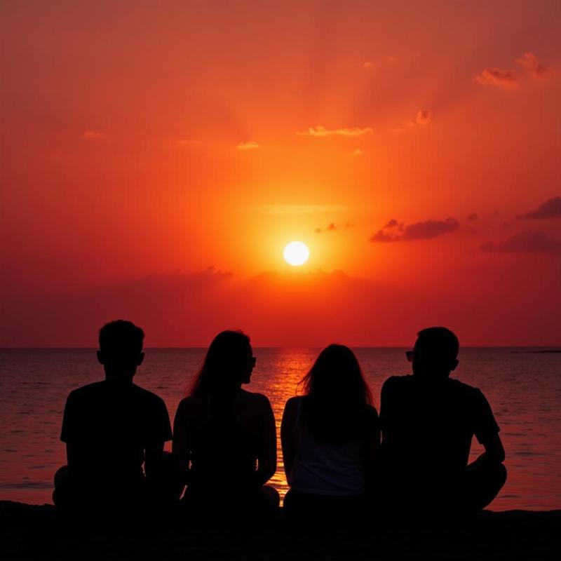 Friends watching sunset at Chennai beach