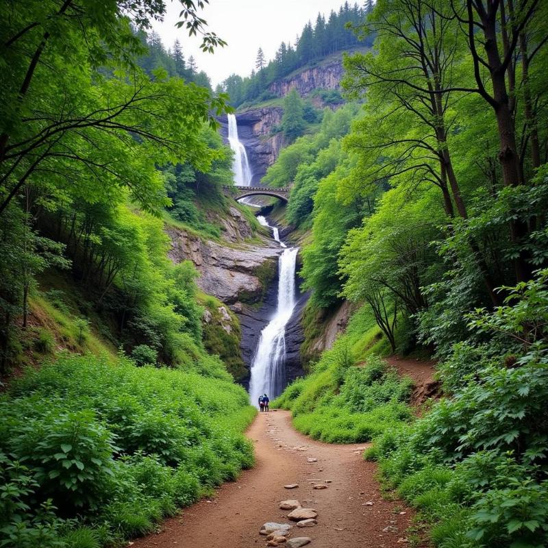 Trekking in Harshil with a waterfall view in the backdrop