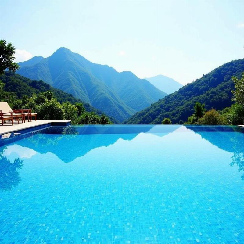 Resort swimming pool with a mountain view in Malshej Ghat