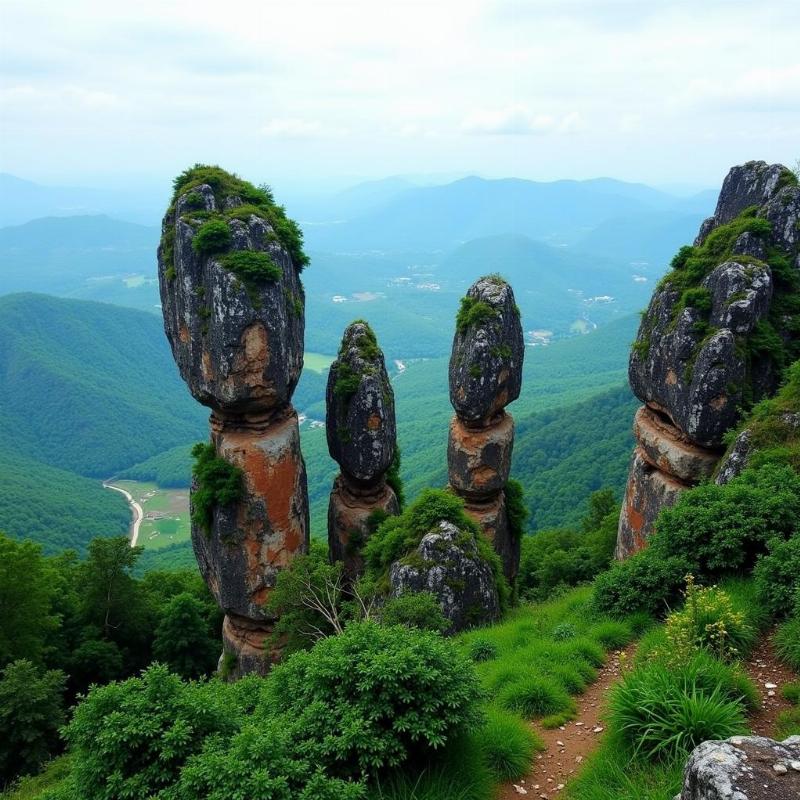 The majestic Pillar Rocks in Kodaikanal, a popular tourist destination.