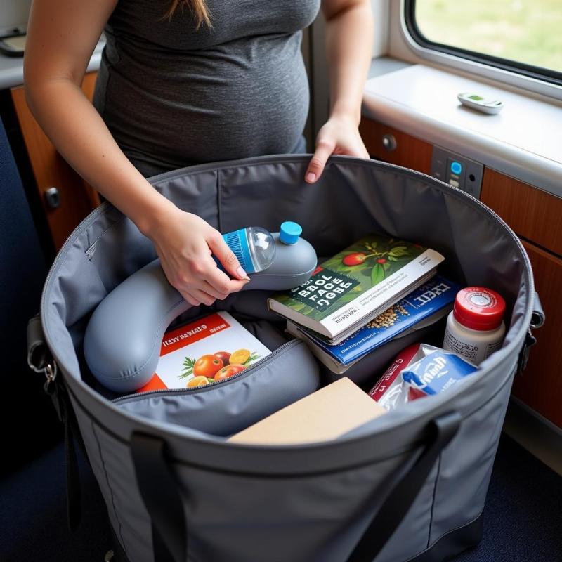 Pregnant woman packing a bag for train travel