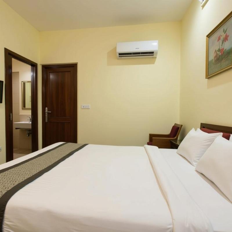 Clean and comfortable room in a budget hotel in Yelagiri