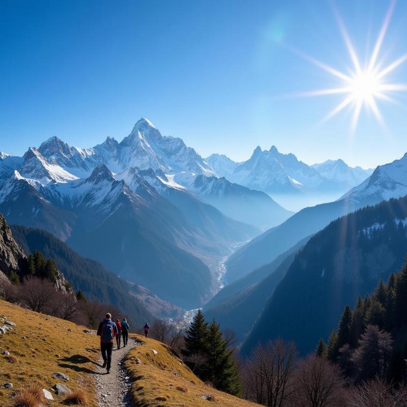 Scenic view of a mountain range in Himachal with trekkers in the foreground